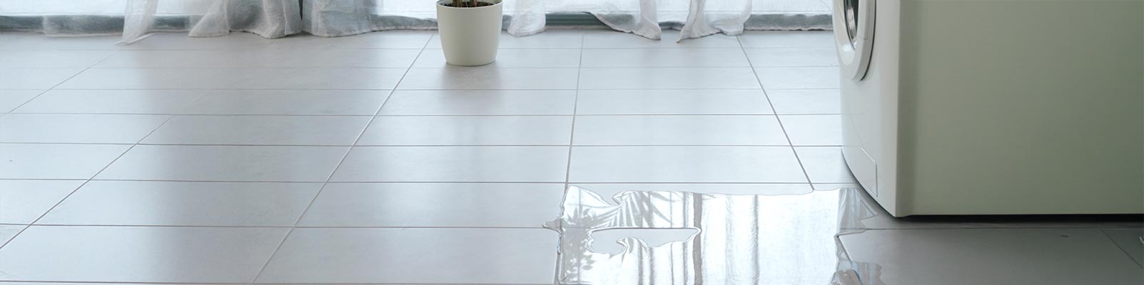 Appliance leakage causes flooded tile floor