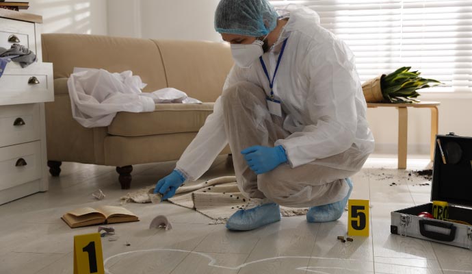 Person cleaning biohazard waste