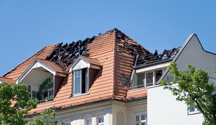 Fire damaged house roof