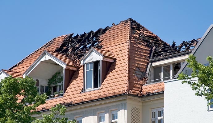 Fire damaged house roof