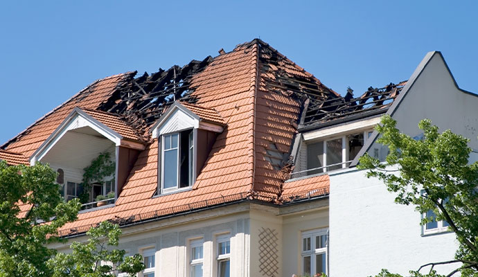 Fire damaged residential house roof