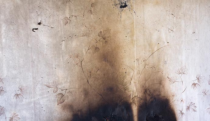 Smoke-damaged drywall
