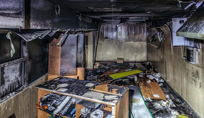 Fire-damaged property with burned contents
