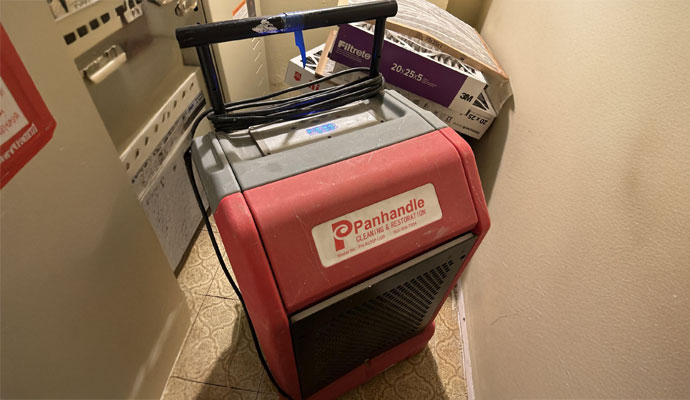 Restoration dehumidifier water damage
