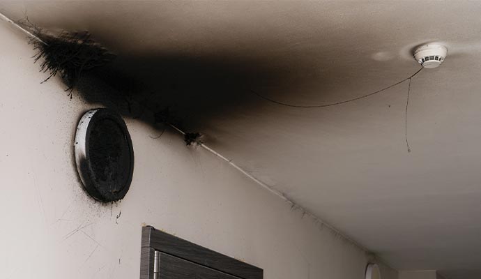 Severely smoke damaged ceiling