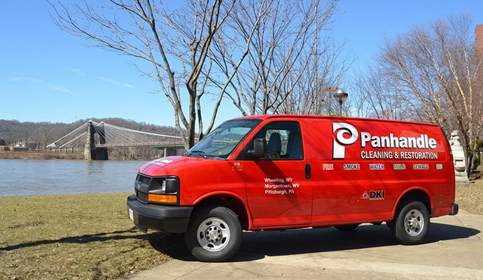 Panhandle Cleaning & Restoration service van parked outdoors