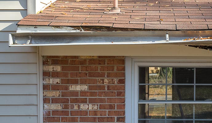 Damaged gutter on a house